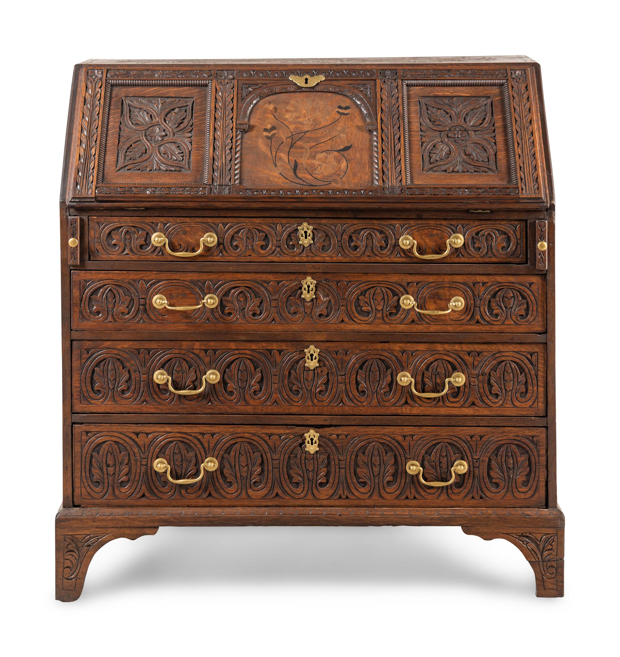 An Anglo-Indian Style Carved Oak and Marquetry Fall-Front Bureau