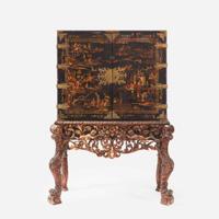 A George III Gilt Decorated Black Lacquered Cabinet on Stand late 18th century