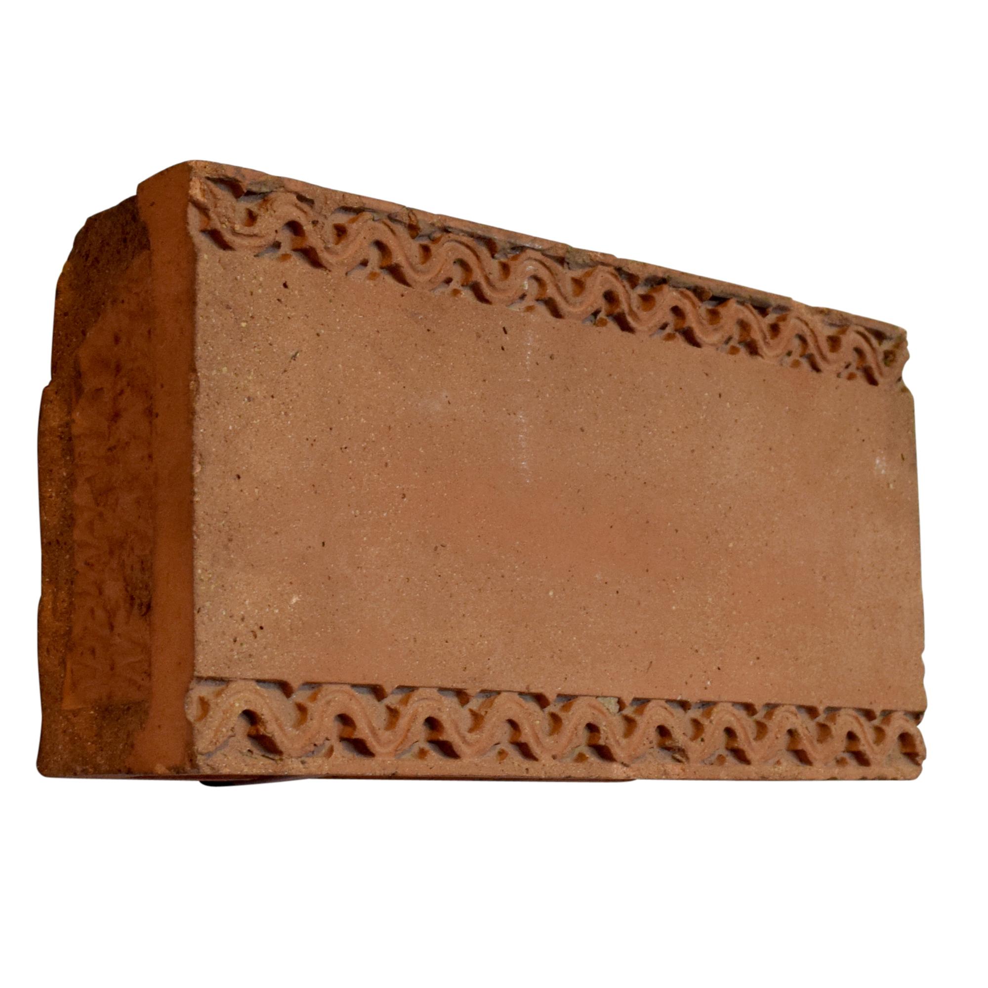 A Frank Lloyd Wright Designed Terra Cotta Fragment from the Francisco Terrace, Chicago, IL. 16" W x 5" D x 8" H — United States, Circa 1895