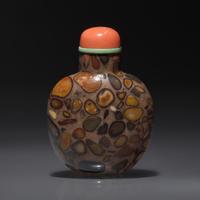 A Chinese Puddingstone Snuff Bottle, Qing Dynasty, Circa 1750-1860 — 1750-1860年 抱子石素面鼻煙壺