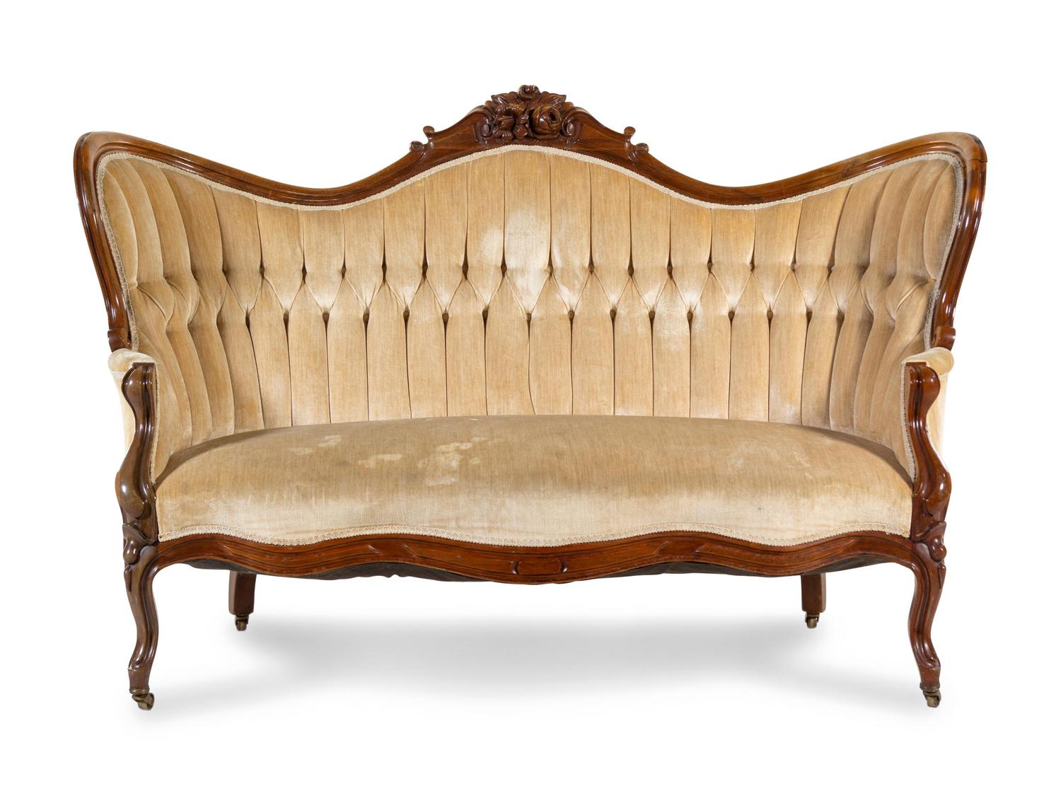 A Rococo Revival Walnut Sofa