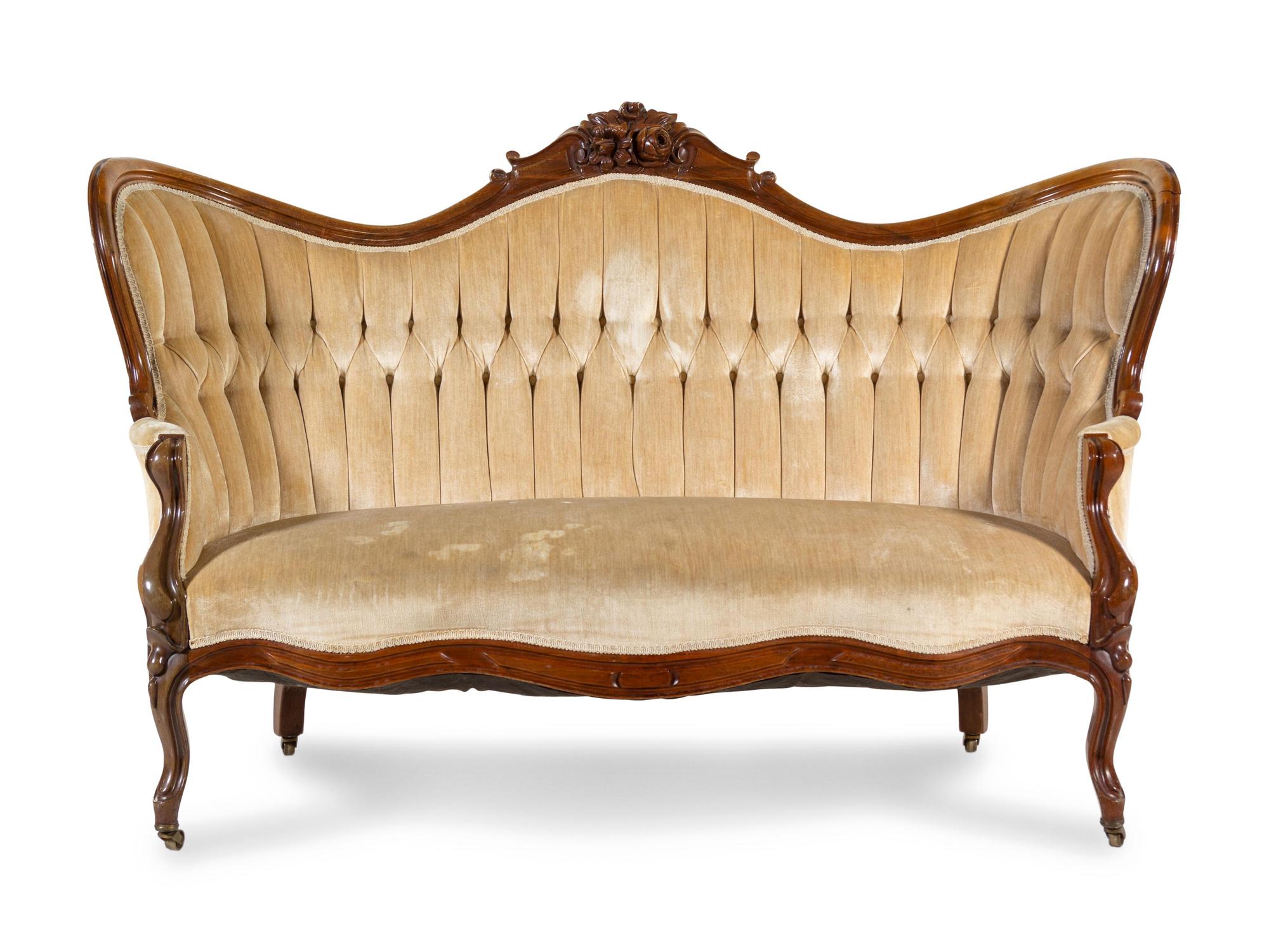 A Rococo Revival Walnut Sofa