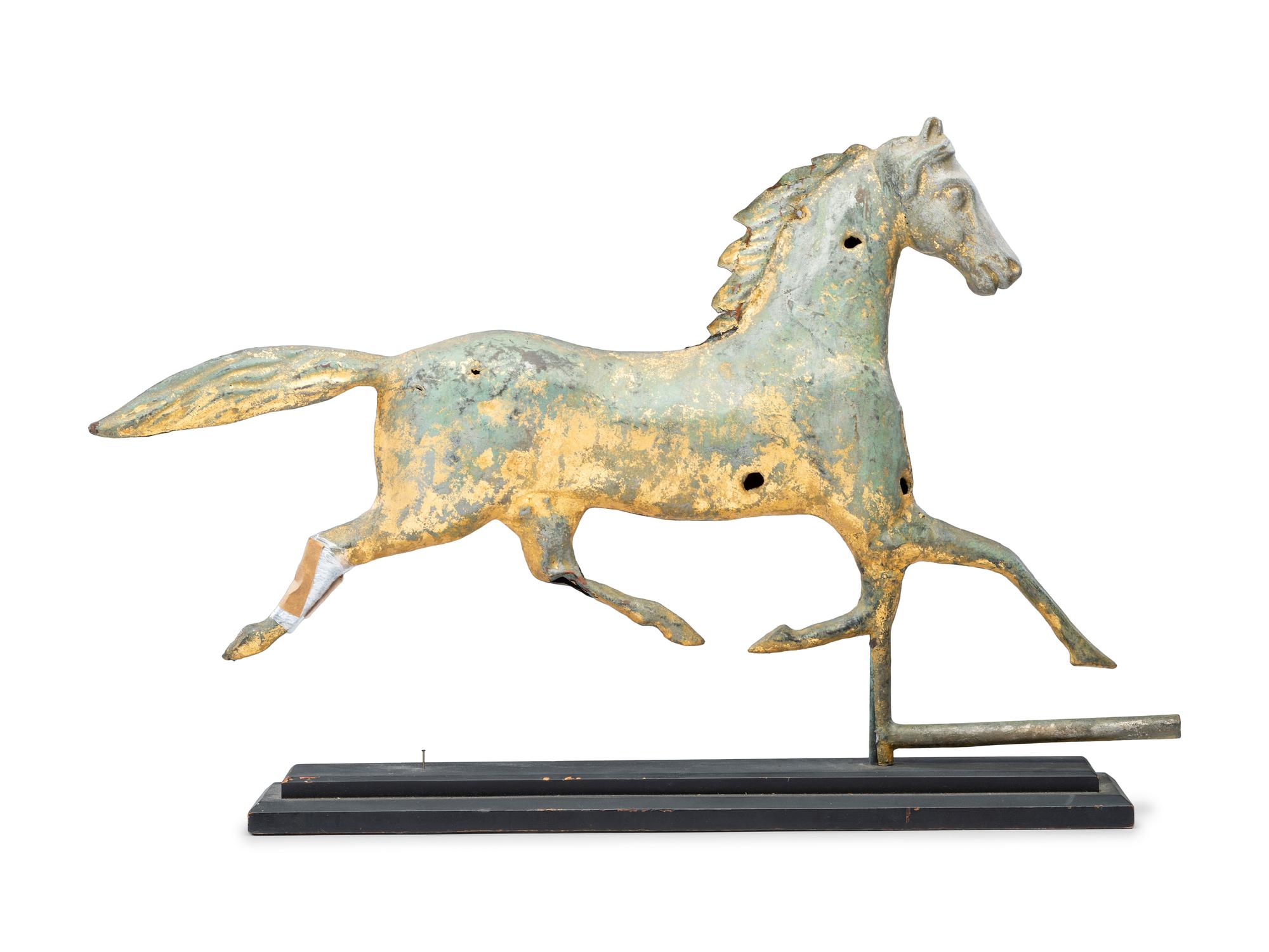 A Cast Zinc and Parcel Gilt Molded Copper Trotting Horse Weathervane