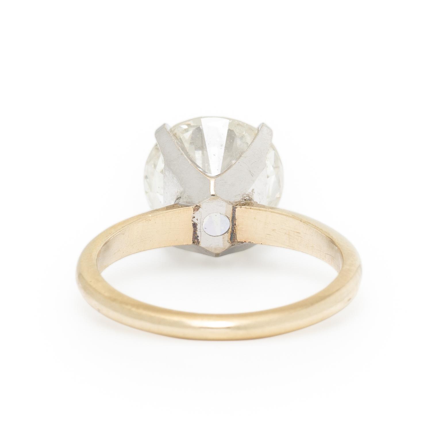 DIAMOND AND BICOLOR GOLD RING WITH JACKET