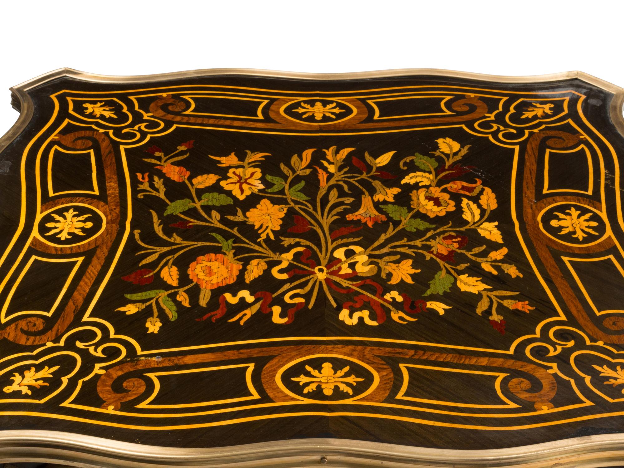 A Pair of Louis XV Style Gilt Bronze Mounted Marquetry Tables