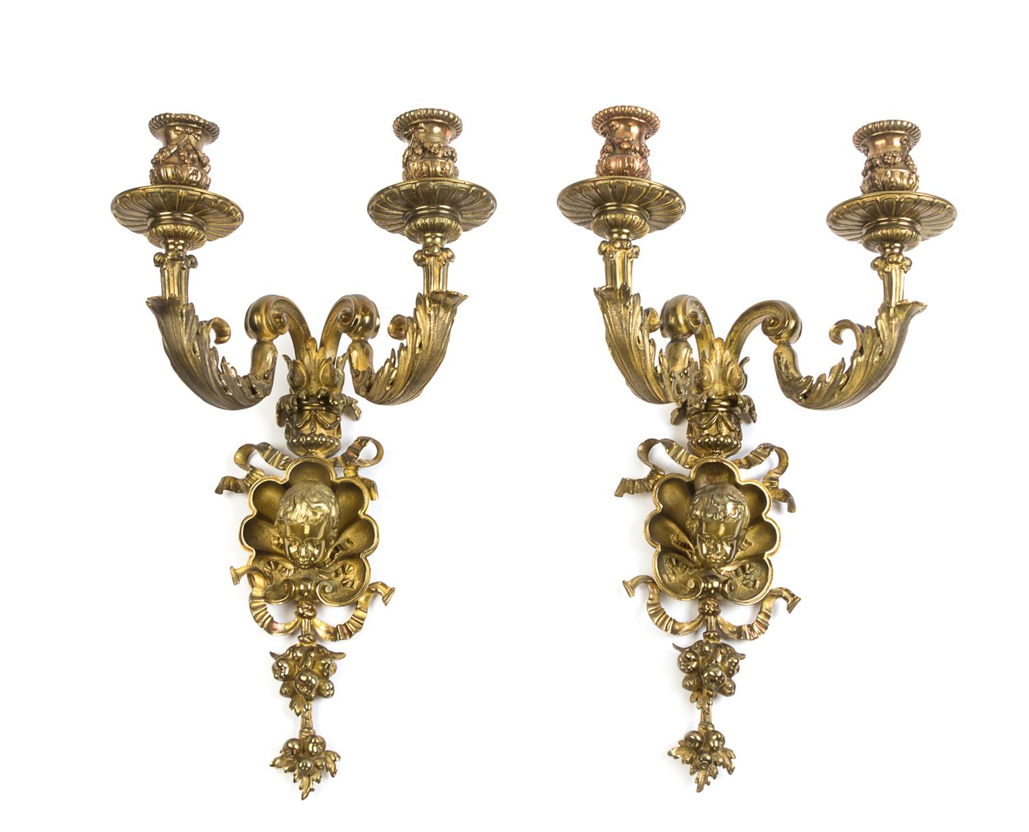 A Pair of Neoclassical Gilt Bronze Two-Light Sconces Height 19 1/2 inches. — LATE 19TH/EARLY 20TH CENTURY