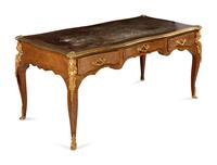 A Louis XV Style Gilt Bronze Mounted Kingwood Bureau Plat