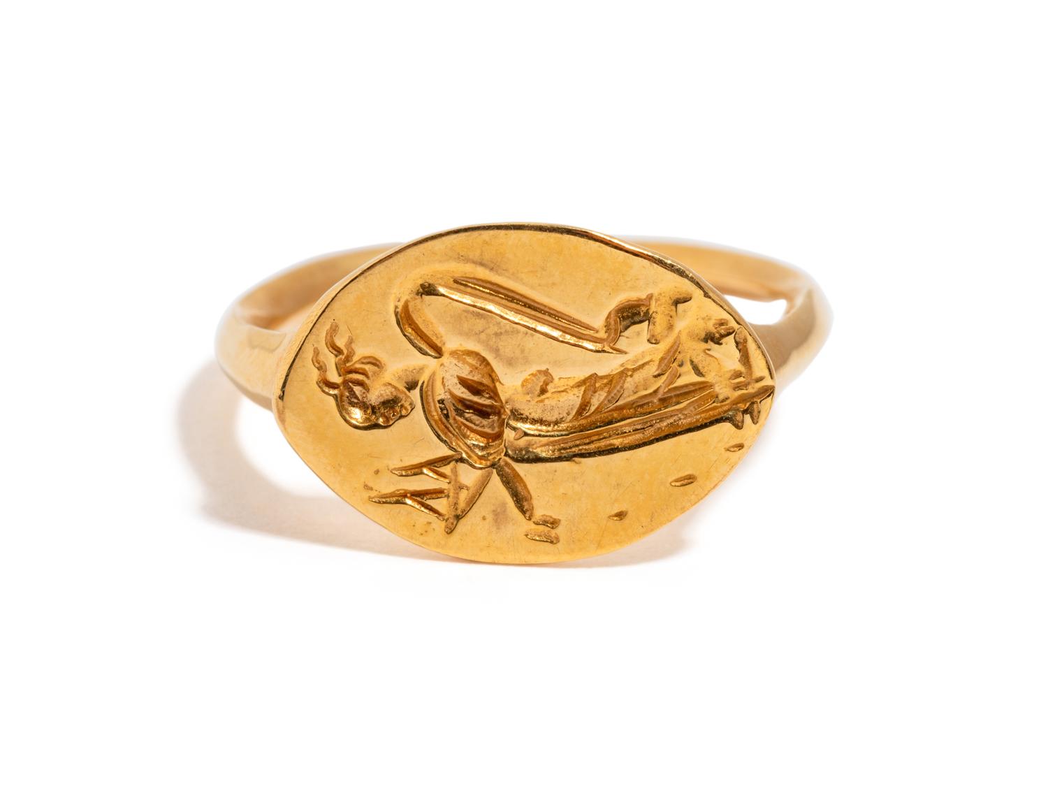 A Greek Style Gold Finger Ring with a Nymph Sowing Seeds