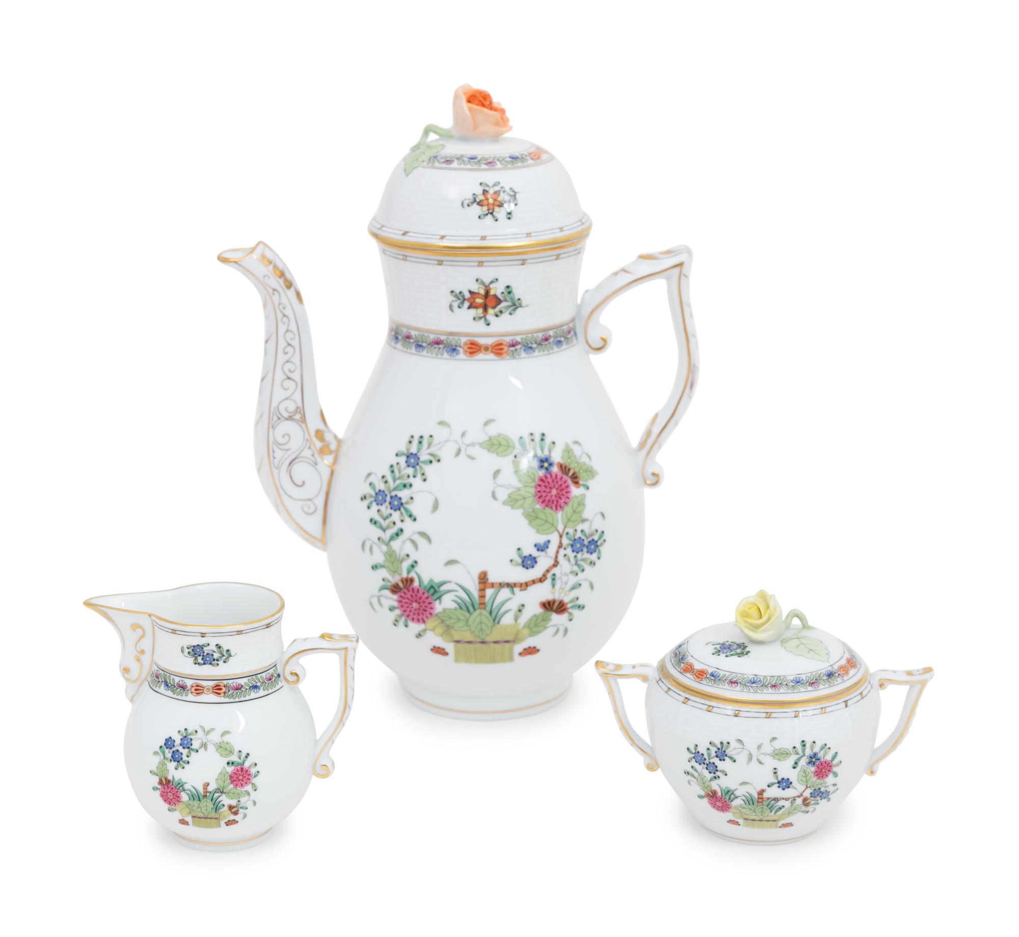 A Herend Porcelain Indian Basket Dinner Service