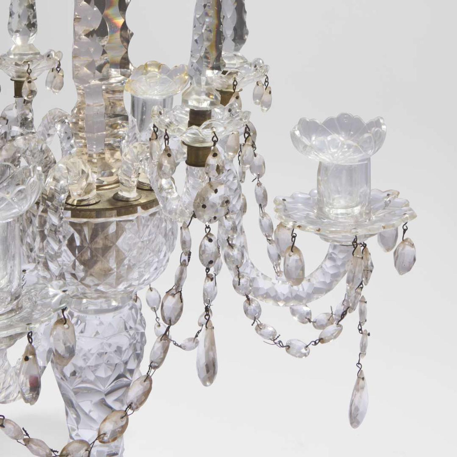 A pair of elaborate Georgian cut-glass four-light candelabra 18th or 19th century