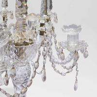 A pair of elaborate Georgian cut-glass four-light candelabra 18th or 19th century
