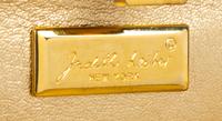 A Judith Leiber Clear Crystal Minaudiere, 7" x 4.25" x 1".