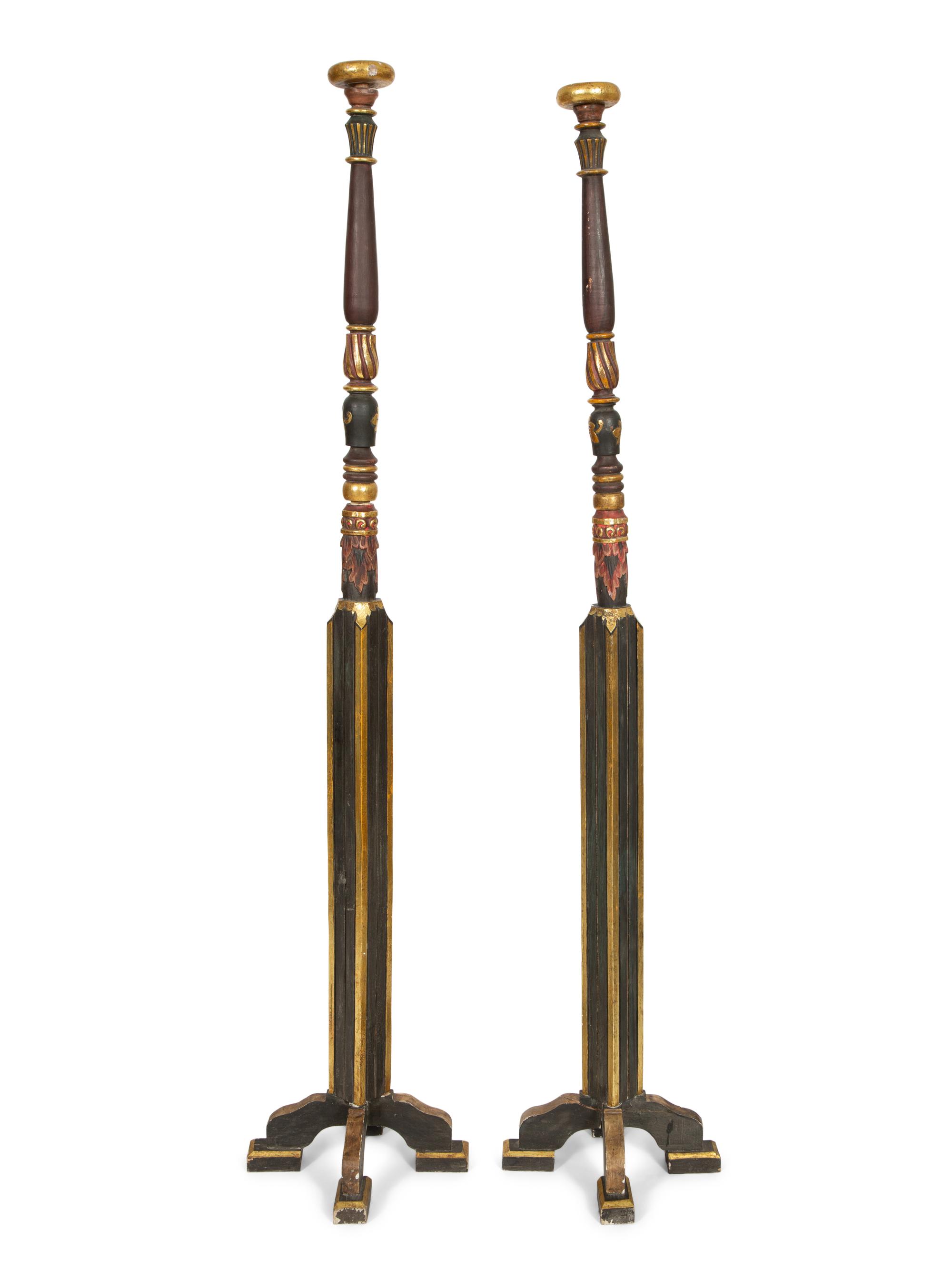 A Pair of Neoclassical Style Black and Gilt Torcheres