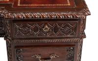 A George III Style Carved Mahogany Pedestal Desk