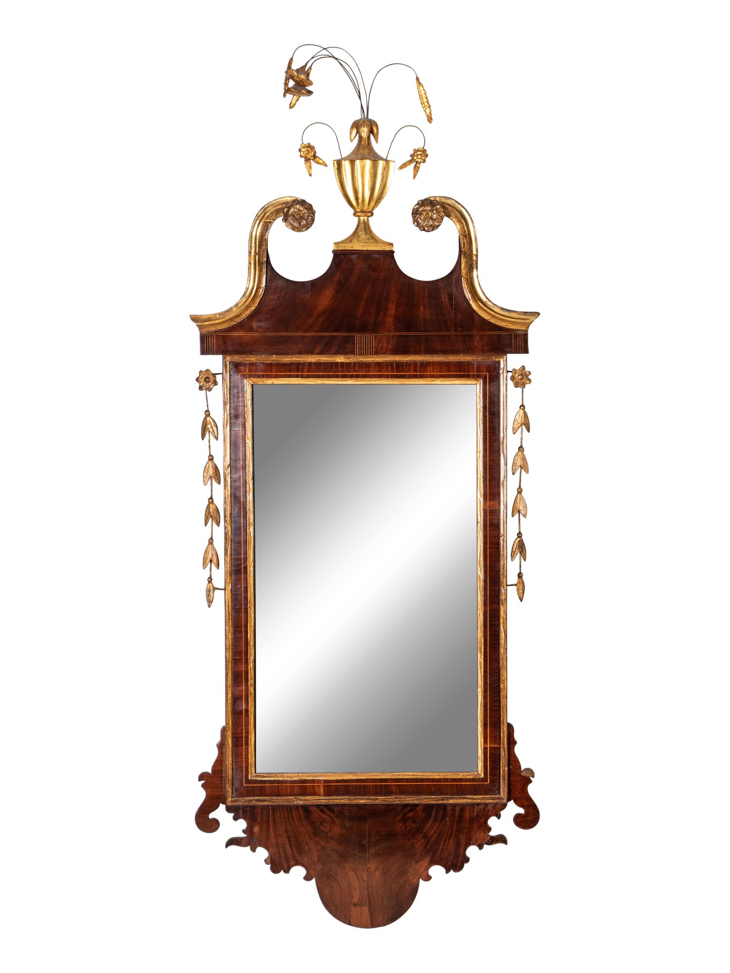A George III Parcel Gilt Mahogany Mirror