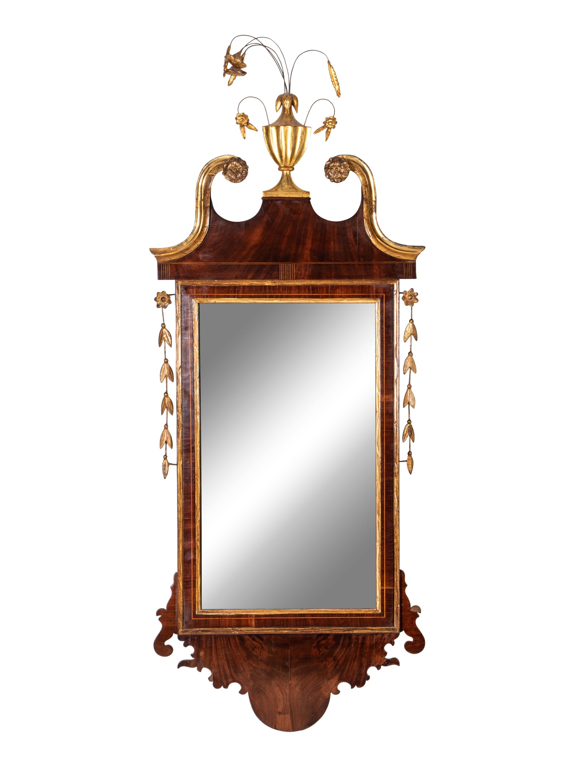 A George III Parcel Gilt Mahogany Mirror