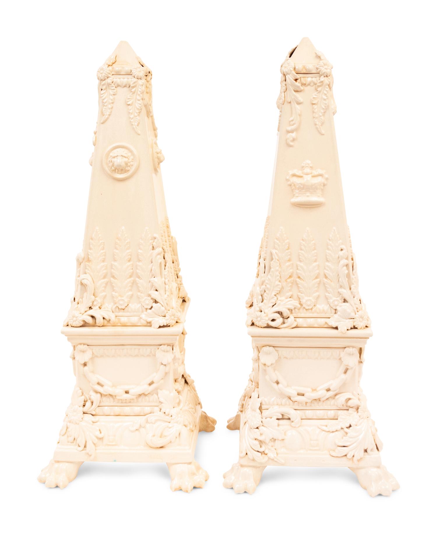 A Near Pair of Peter Weldon Creamware Obelisks