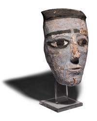 An Egyptian Painted Wood Mummy Mask