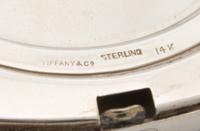 An American Silver, 14-Karat Gold and Ruby Inset Compact, Tiffany & Co., New York, NY, 20th Century, the engine turned lid with an appl