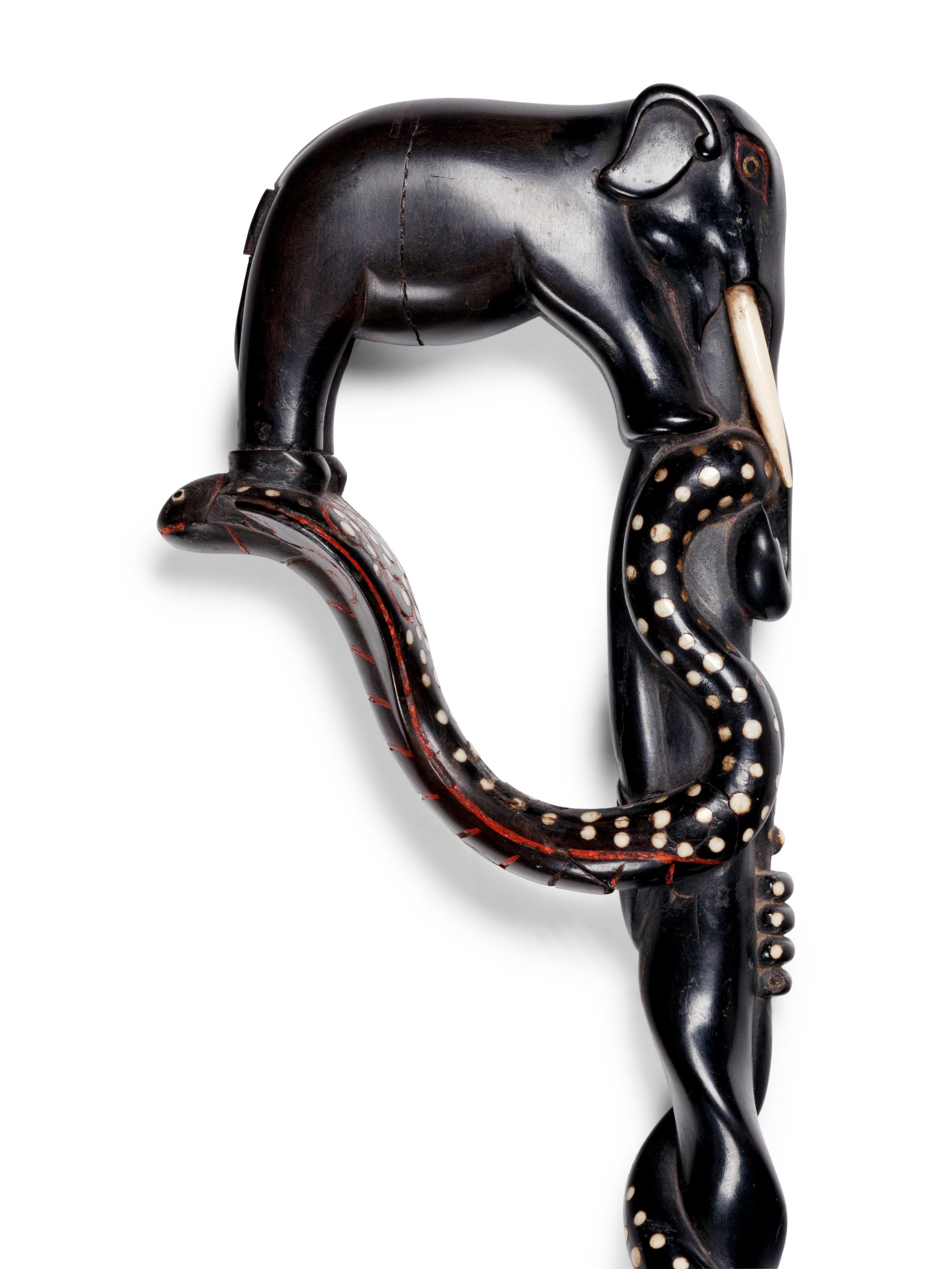 A Carved Ebony Figural Walking Stick