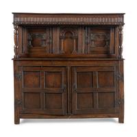 A Jacobean Carved Oak Court Cupboard