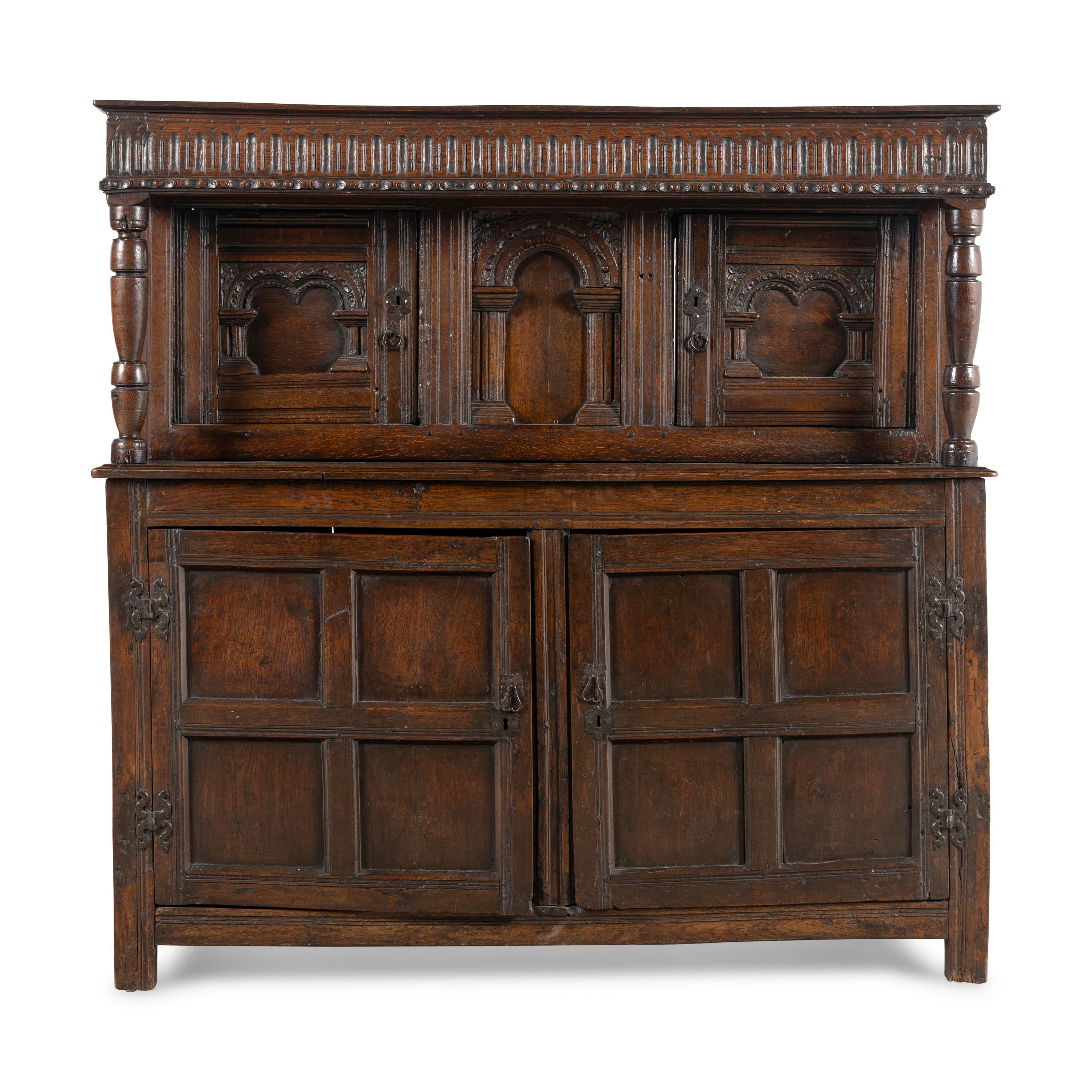 A Jacobean Carved Oak Court Cupboard