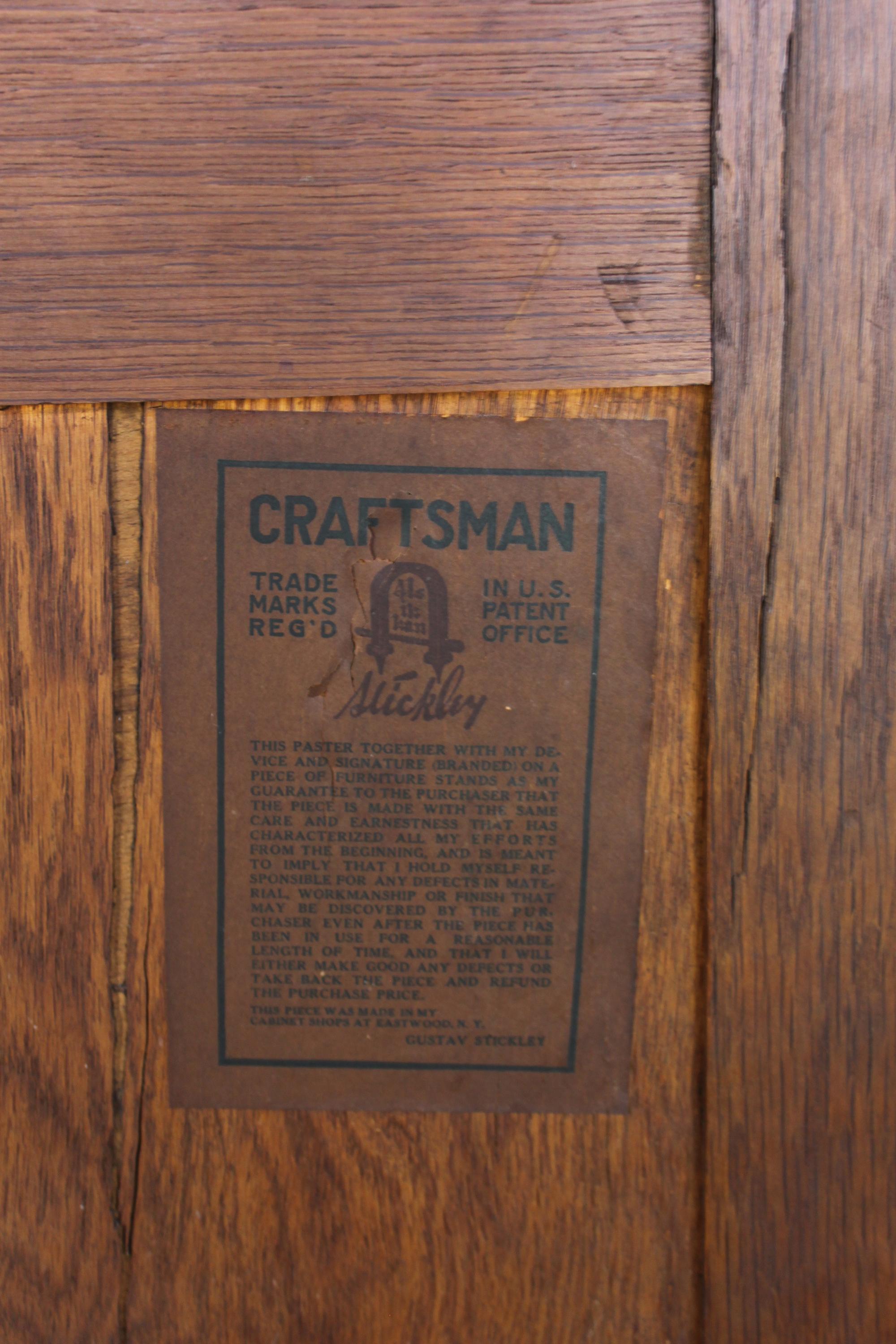 A Gustav Stickley Oak Two Door Bookcase Height 56 x width 47 1/2 x depth 13 inches — CIRCA 1912-1916
