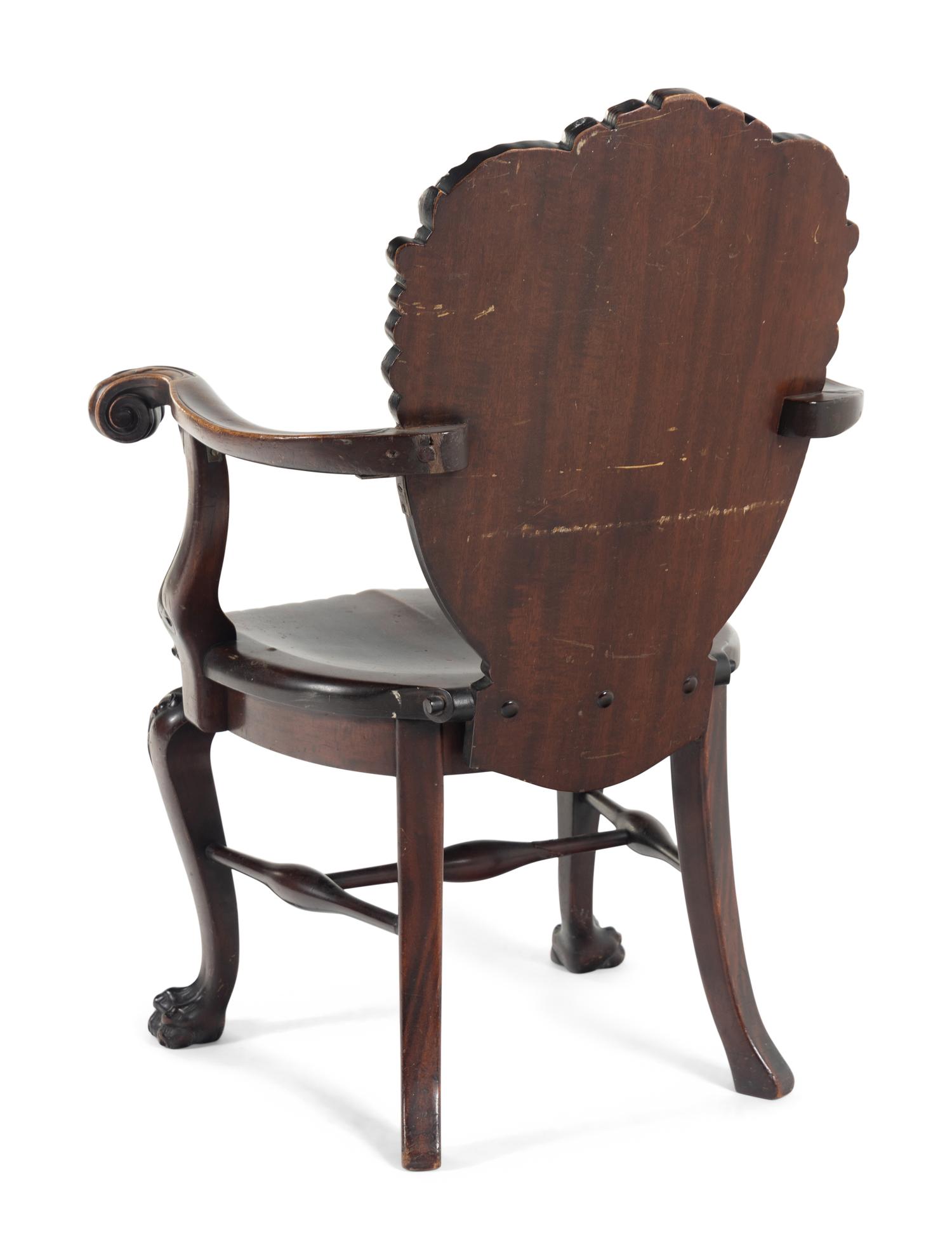 A Baroque Revival Carved Mahogany Armchair
