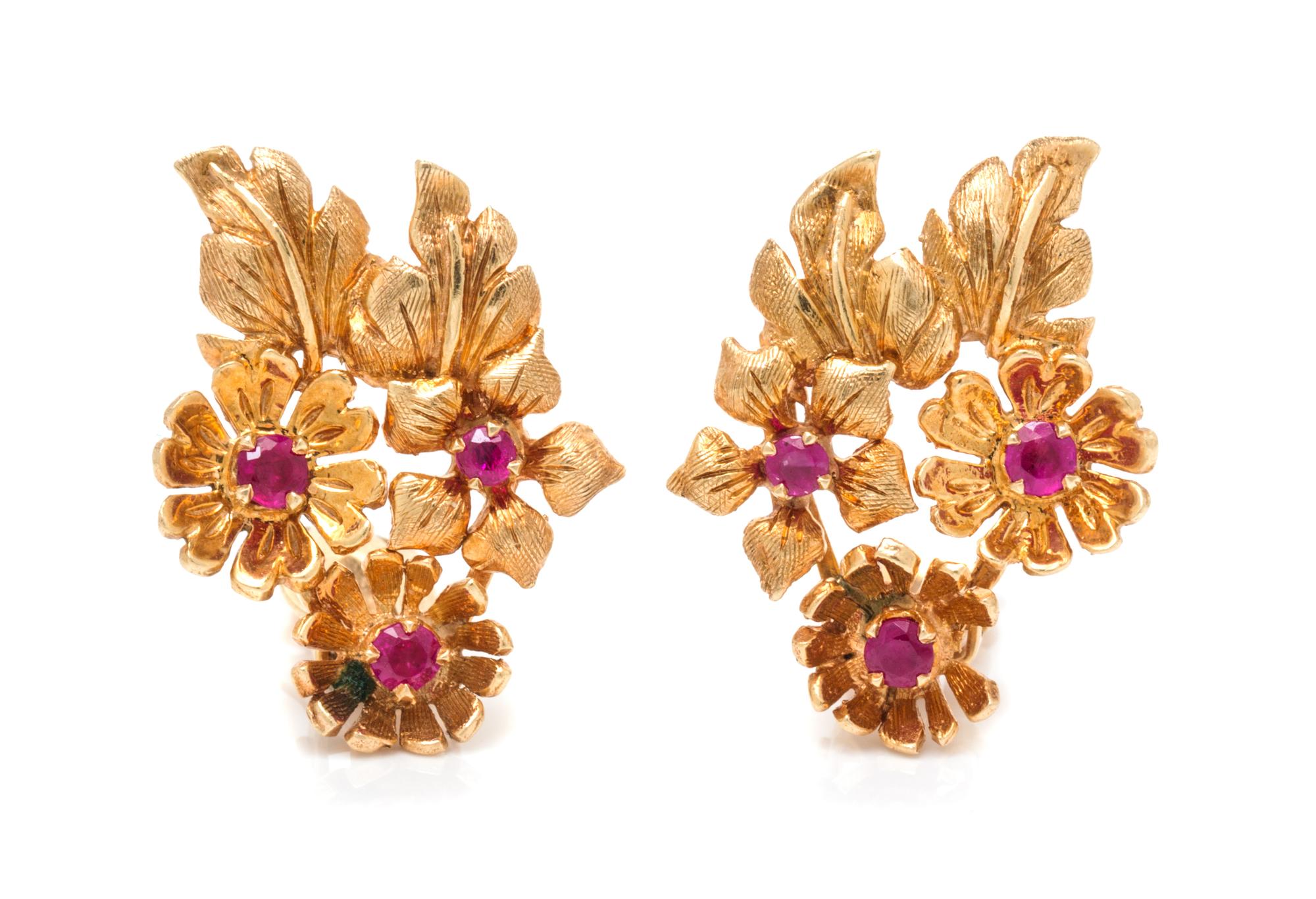 A Pair of 14 Karat Rose Gold and Ruby Floral Motif Earclips, 4.90 dwts.
