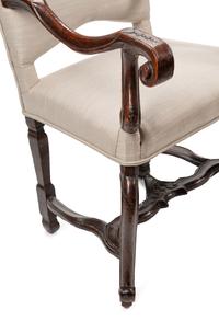 A Pair of Régence Carved Walnut Fauteuils