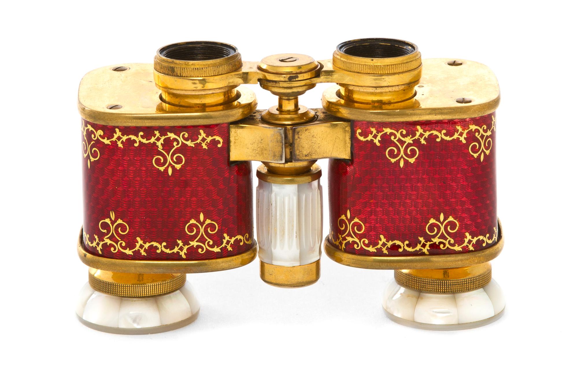 A Pair of French Guilloche Enameled and Mother-of-Pearl Inset Opera Glasses, Colmont, Width 3 3/4 inches.