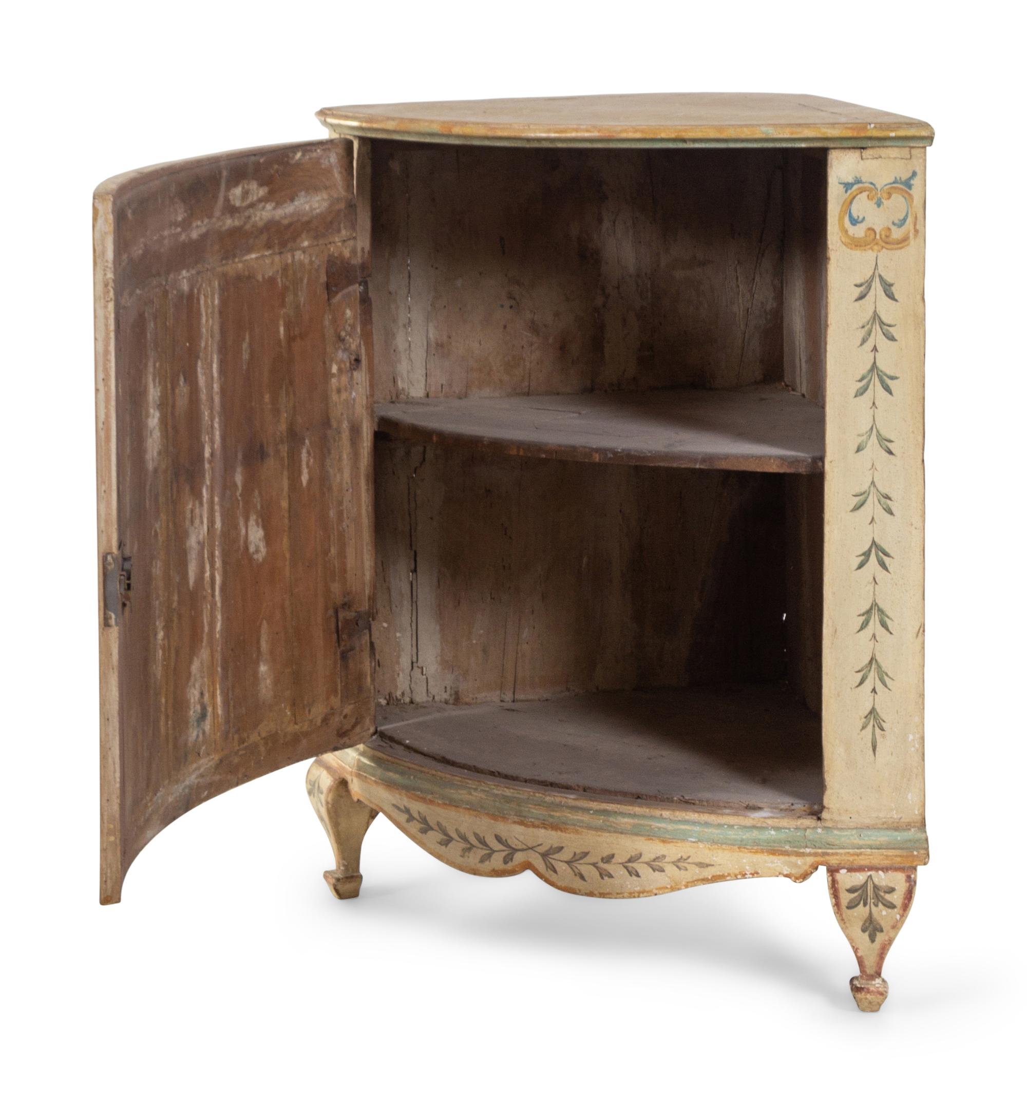 An Italian Painted Corner Cabinet