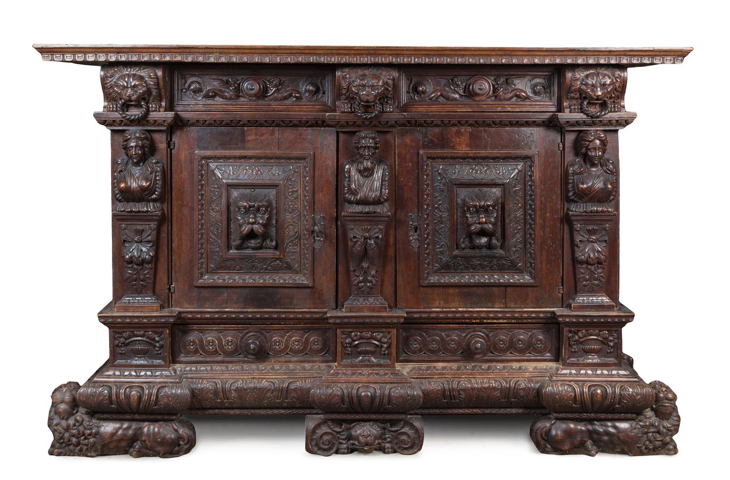 A German Relief Carved Oak Cabinet Height 55 3/4 x width 86 1/2 x depth 27 1/4 inches. — 17TH CENTURY
