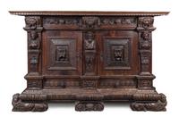 A German Relief Carved Oak Cabinet Height 55 3/4 x width 86 1/2 x depth 27 1/4 inches. — 17TH CENTURY