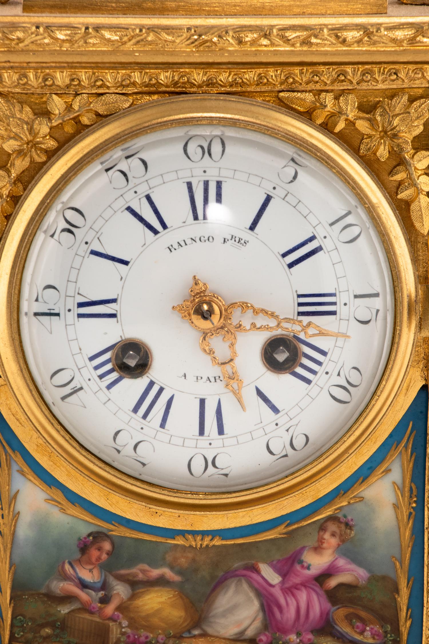 A French Gilt Bronze and Sèvres Style Porcelain Clock