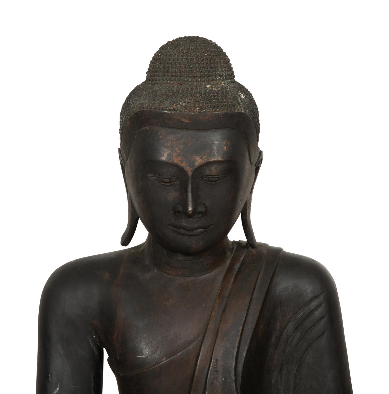 A Large Southeast Asian Bronzed Metal Seated Buddha