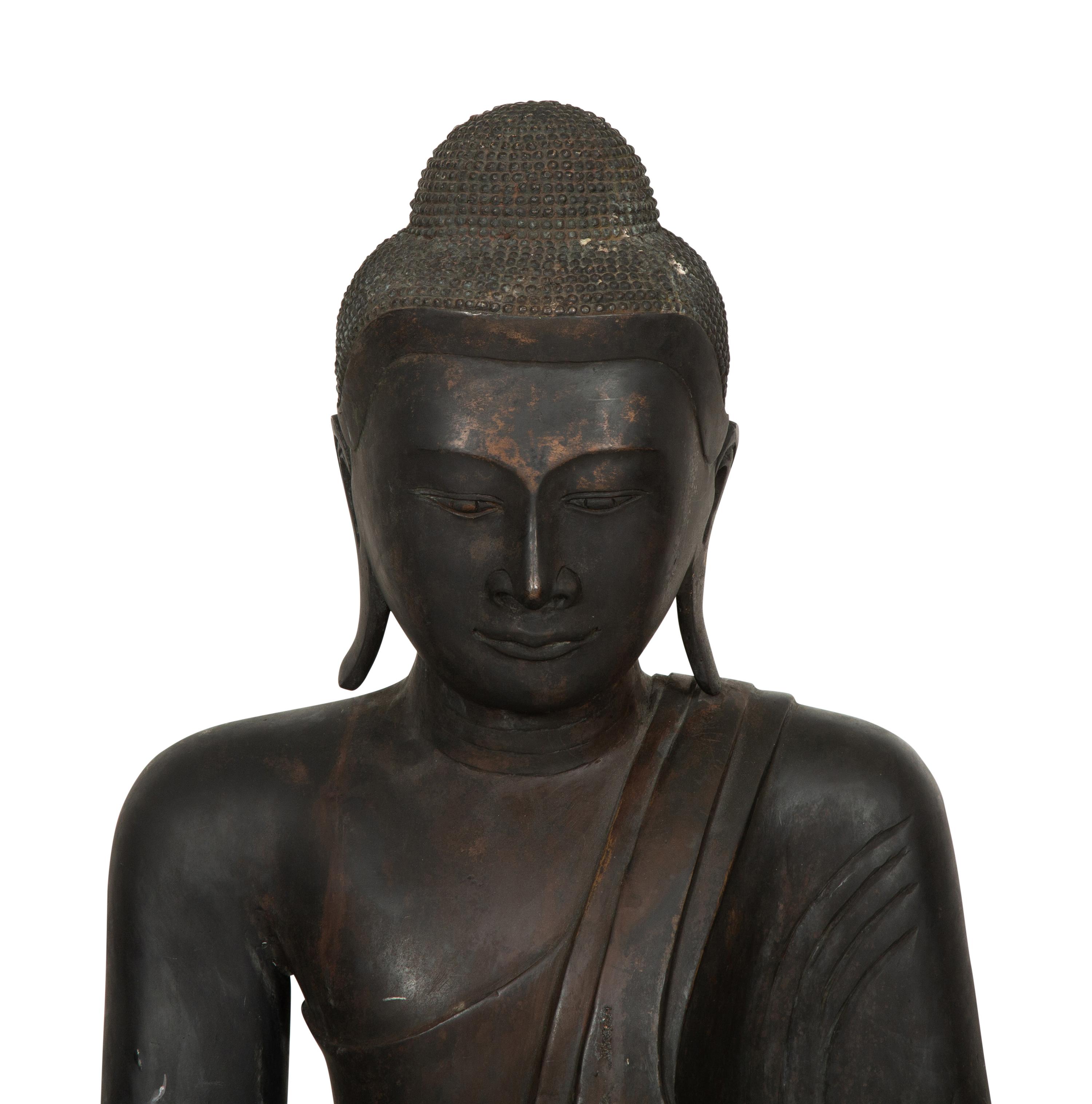 A Large Southeast Asian Bronzed Metal Seated Buddha