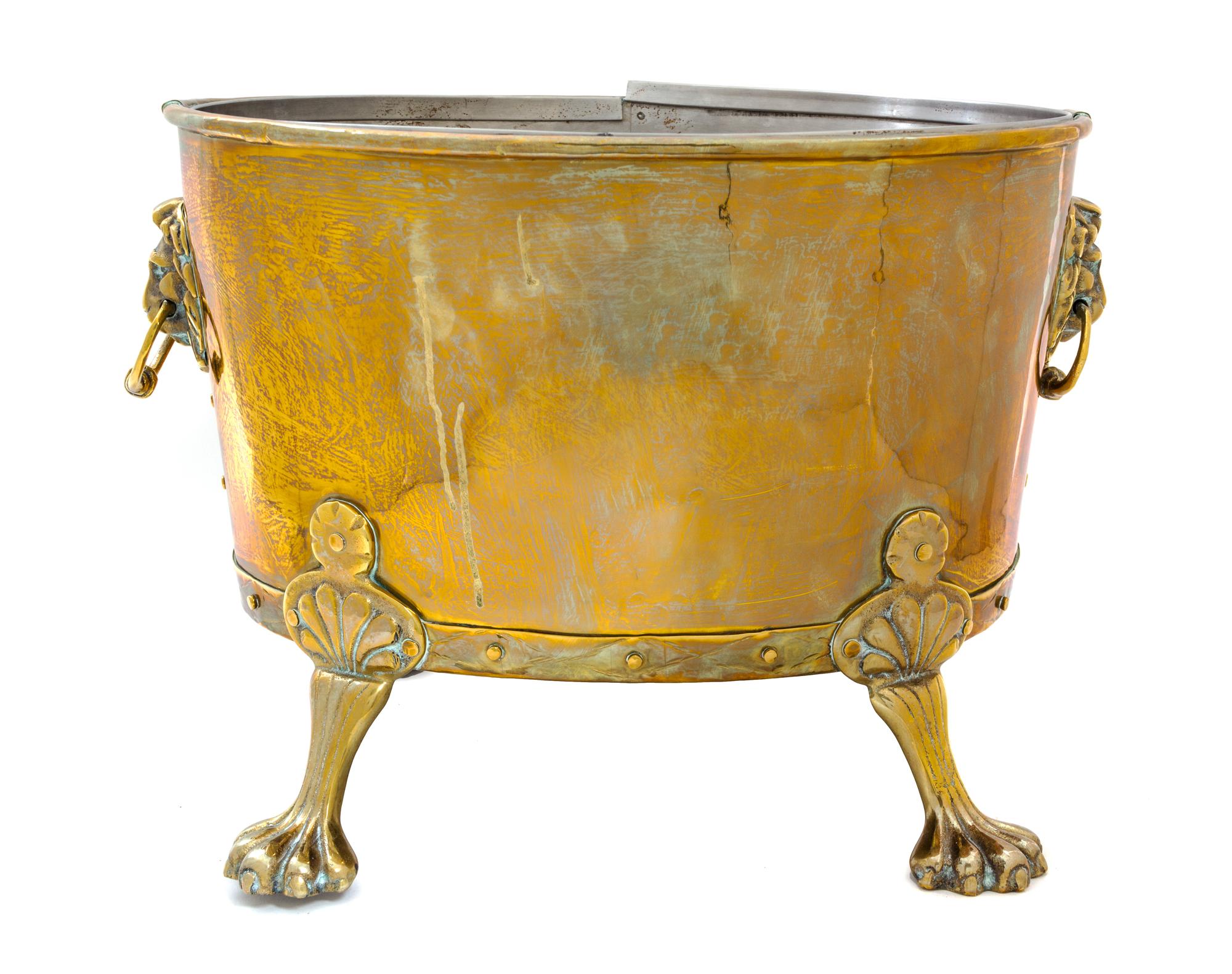 An English Brass Jardiniere Height 12 3/4 x length 17 1/2 inches. — 20TH CENTURY