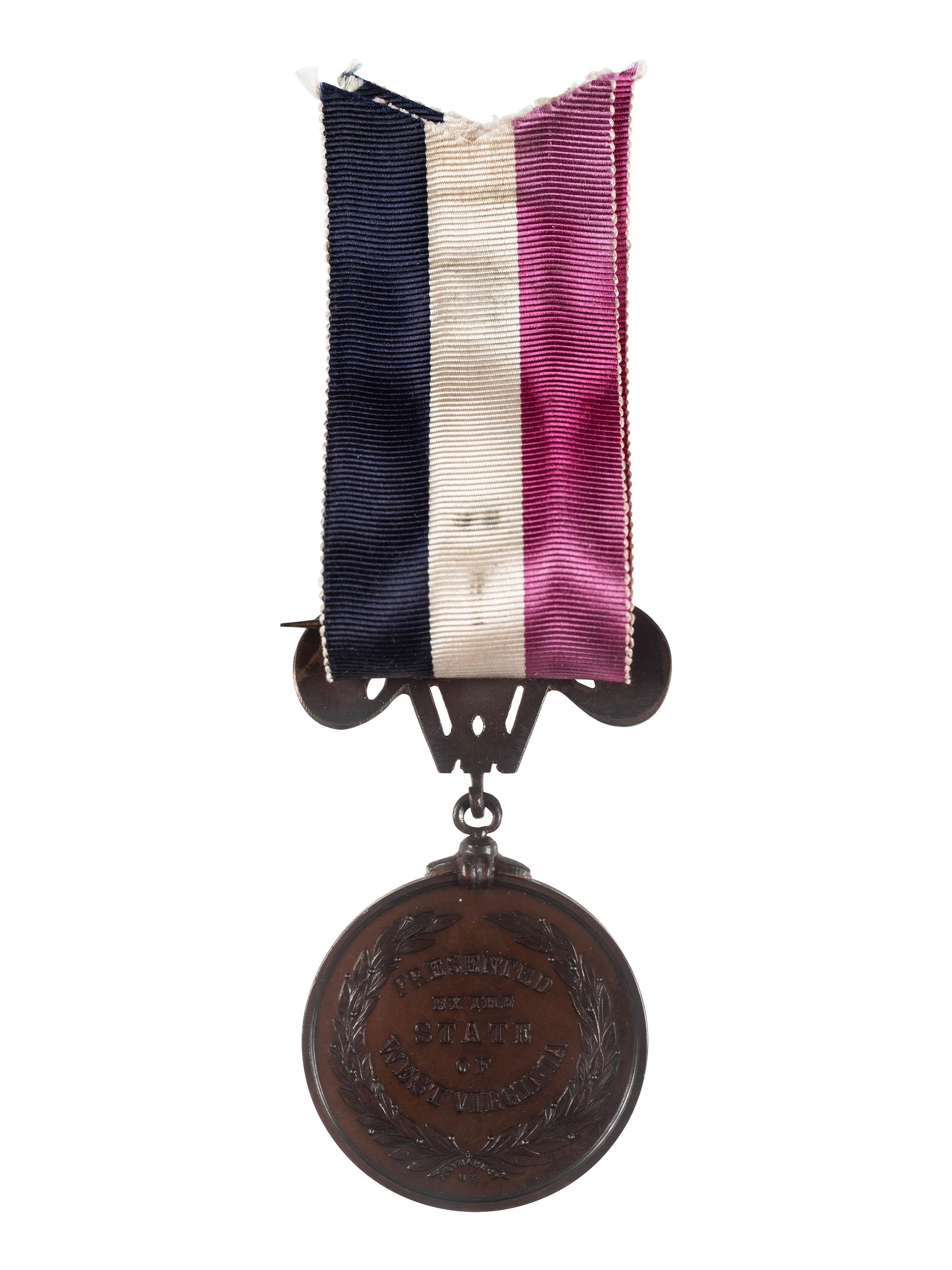 [CIVIL WAR]. West Virginia Honorably Discharged medal presented to James H. Smell, Co. C., 14th West Virginia Infantry.