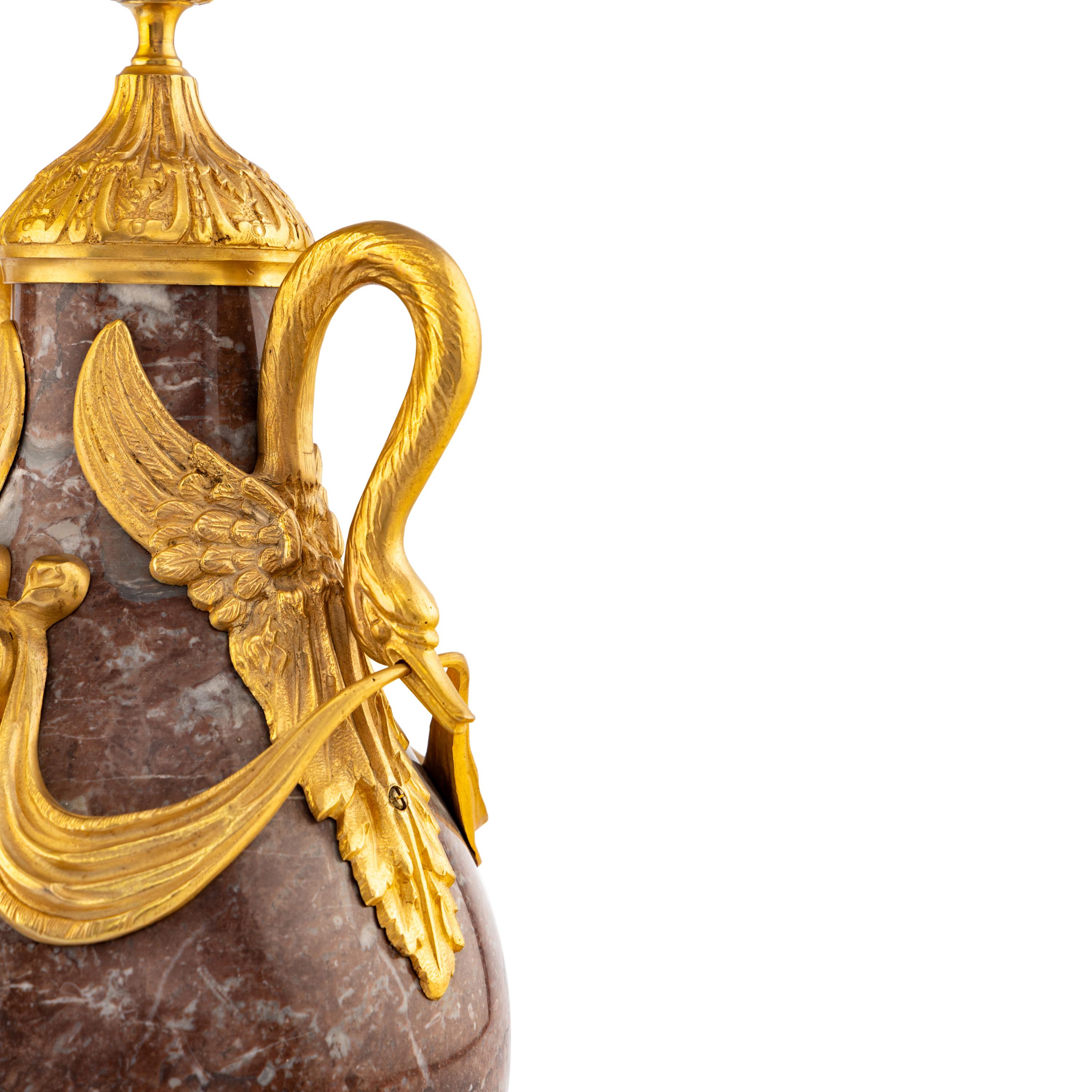 A Pair of Louis XVI Style Gilt Bronze Mounted Marble Urns