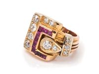 A Rose Gold, Diamond and Ruby Buckle Motif Ring,
