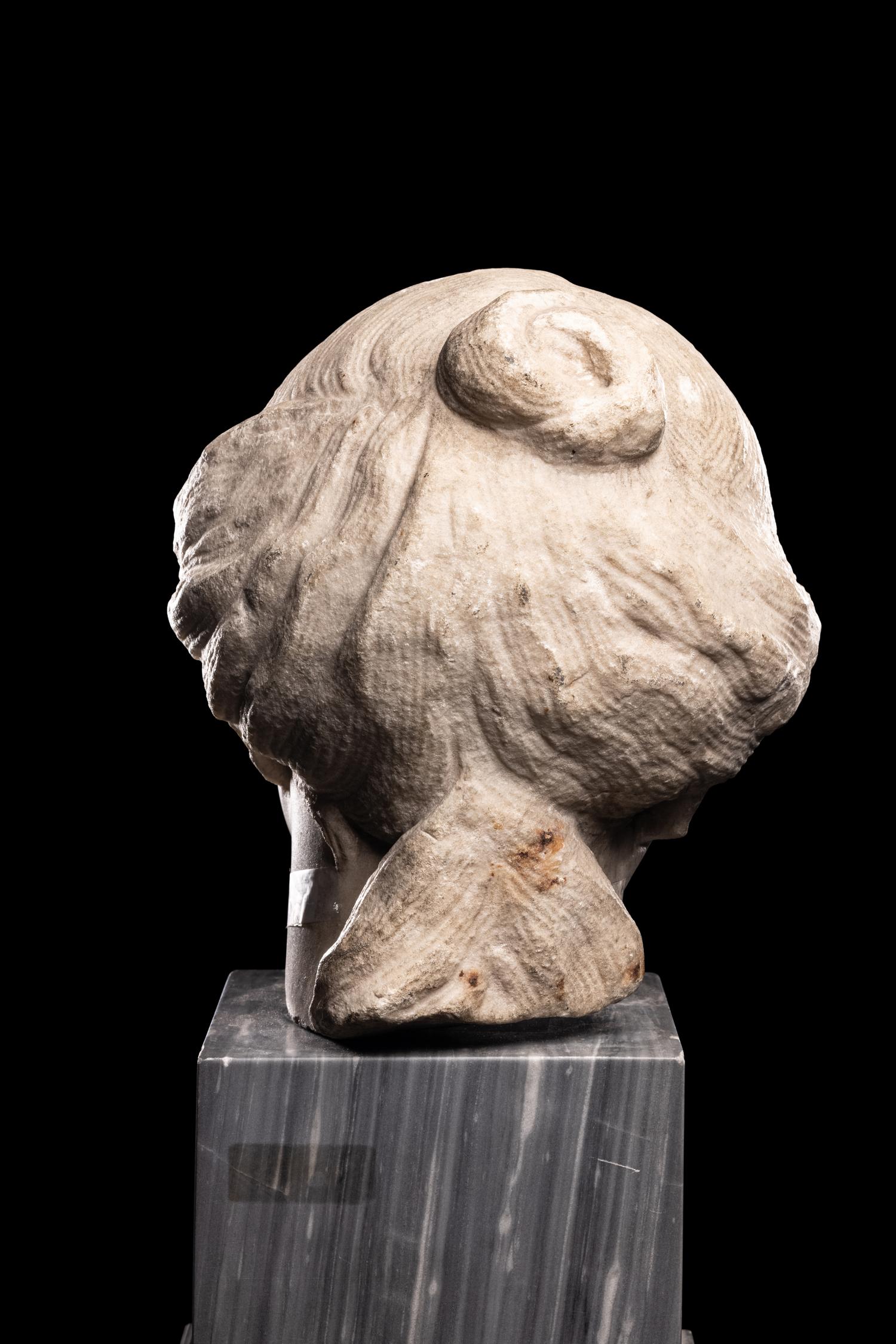 A Roman Marble Portrait Head of a Woman