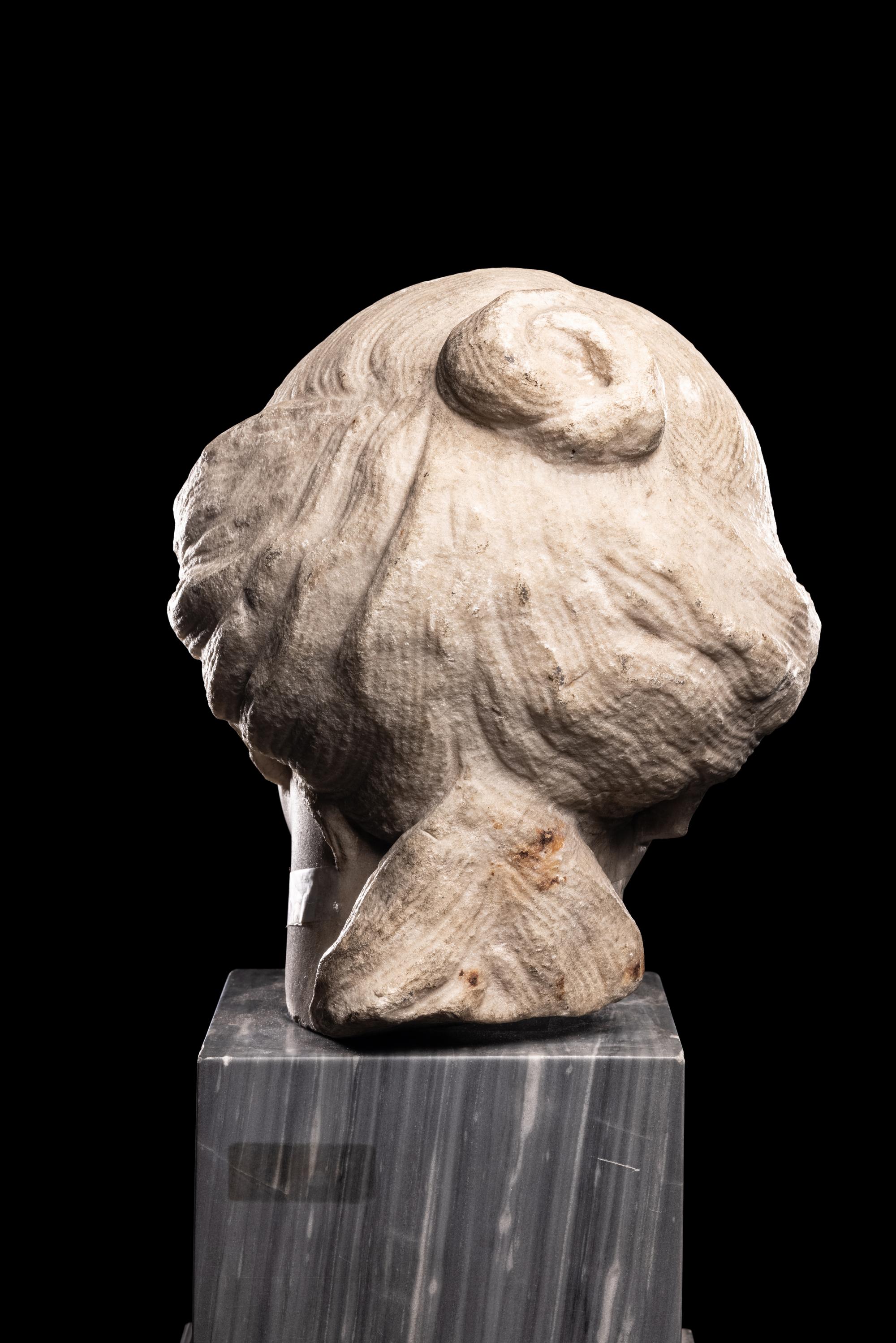 A Roman Marble Portrait Head of a Woman