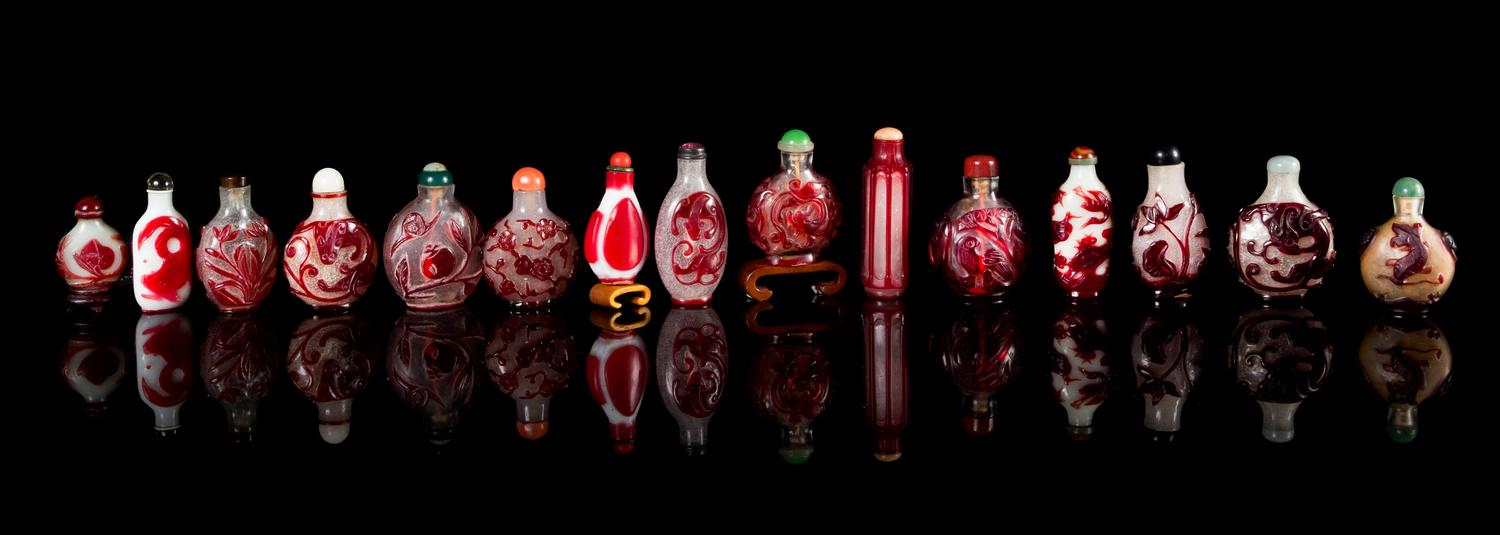 Fifteen Red Overlay Peking Glass Snuff Bottles — 19TH-20TH CENTURY