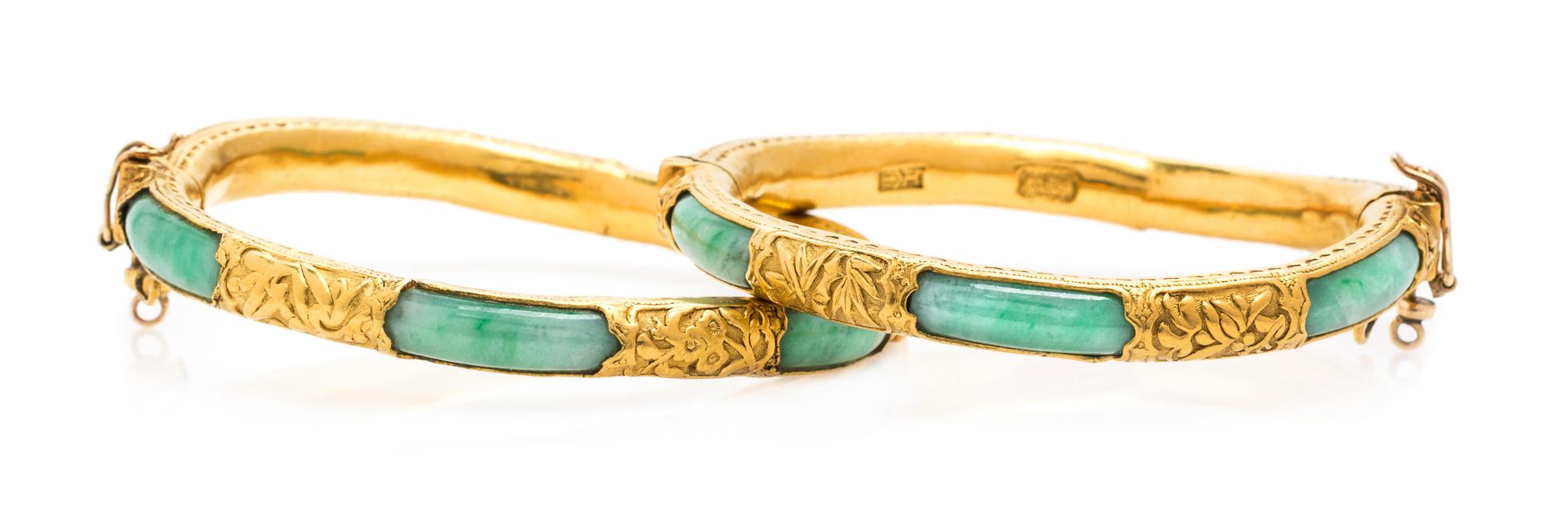 A Pair of High Karat Yellow Gold and Jade Bangle Bracelets, 44.10 dwts.