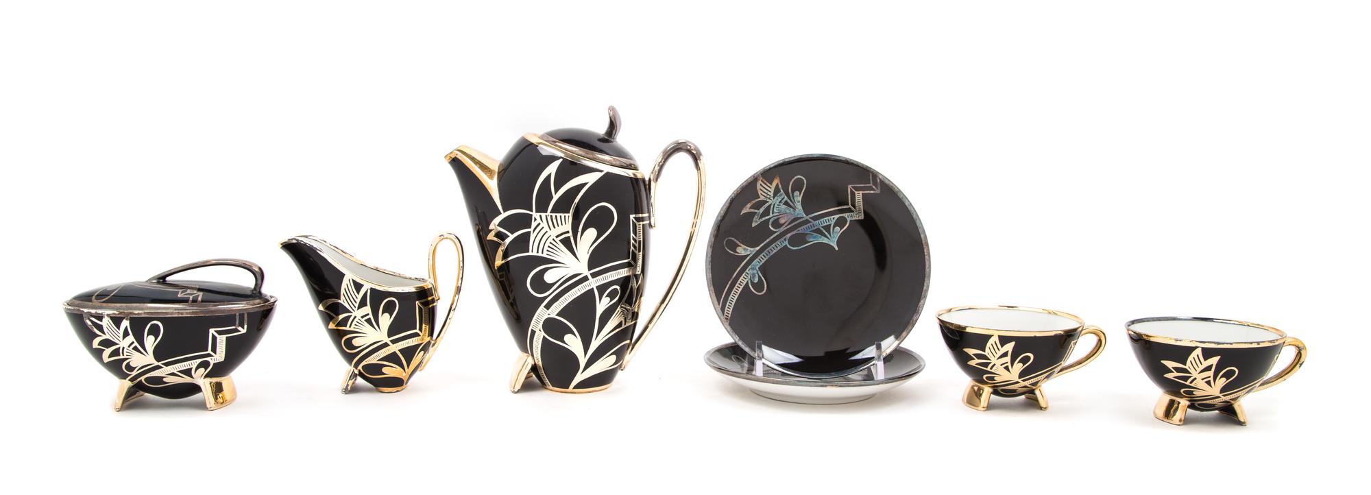 Art Deco, Germany, a coffee service, comprising a coffee pot, creamer, sugar dish and two cups with saucers
