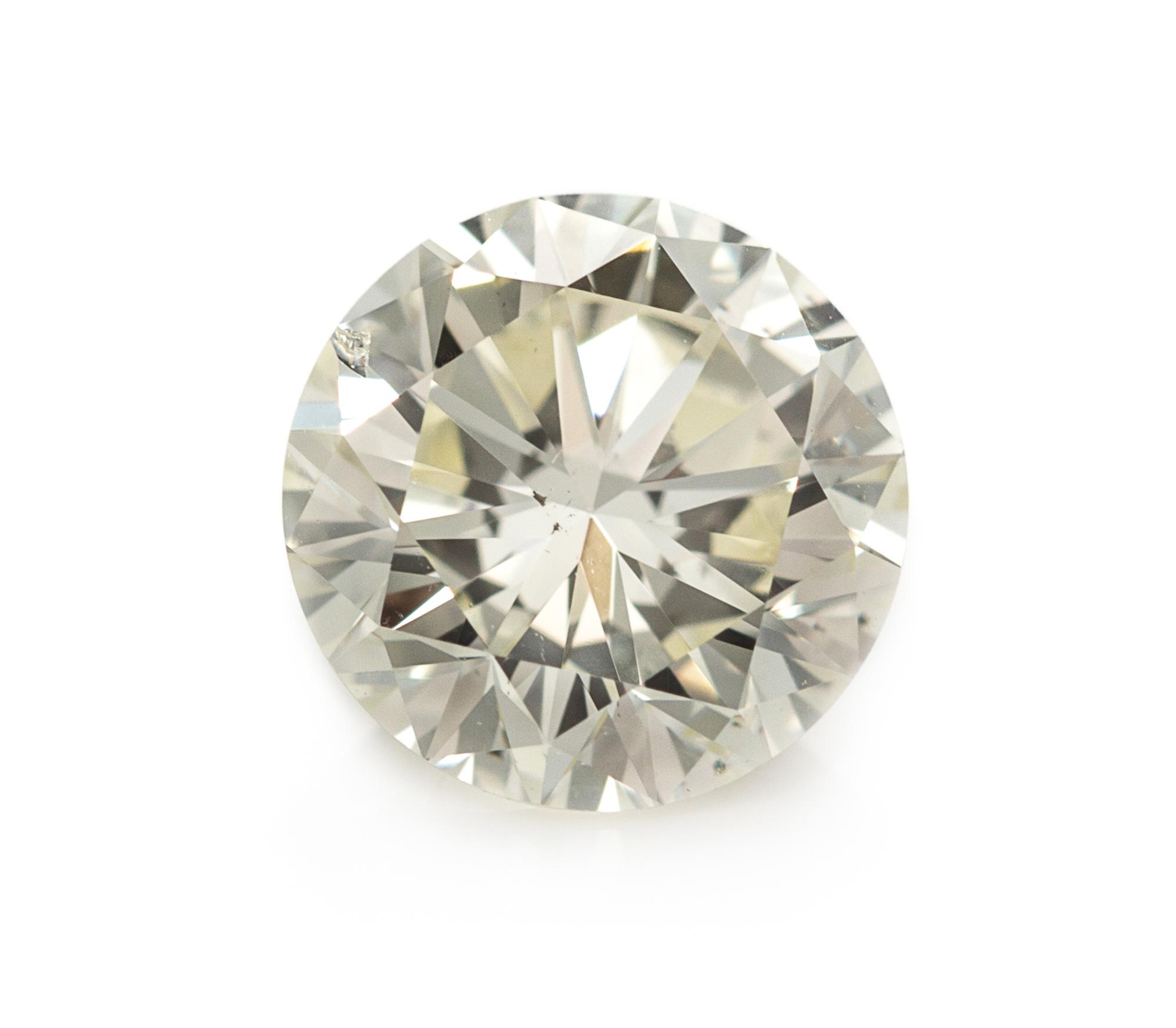 A 0.97 Carat Round Brilliant Cut Diamond,