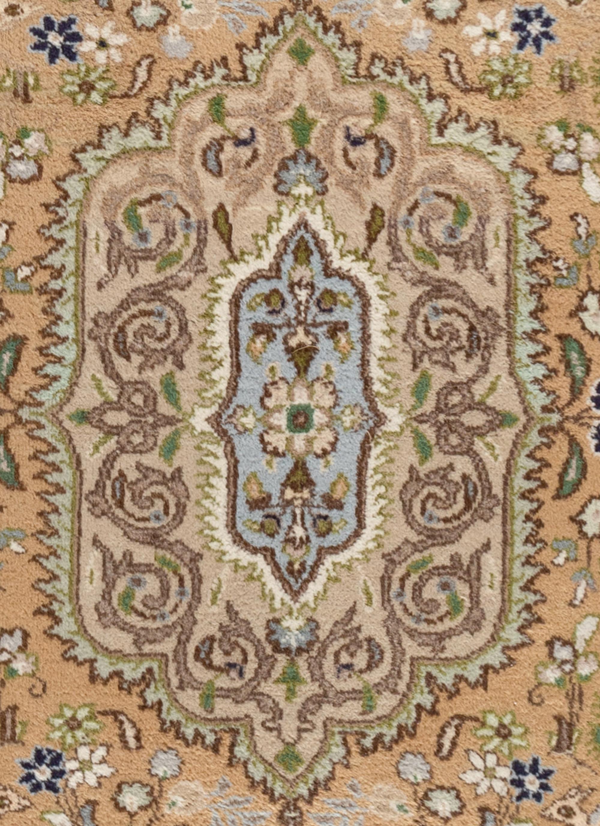 A Kashan Style Rug