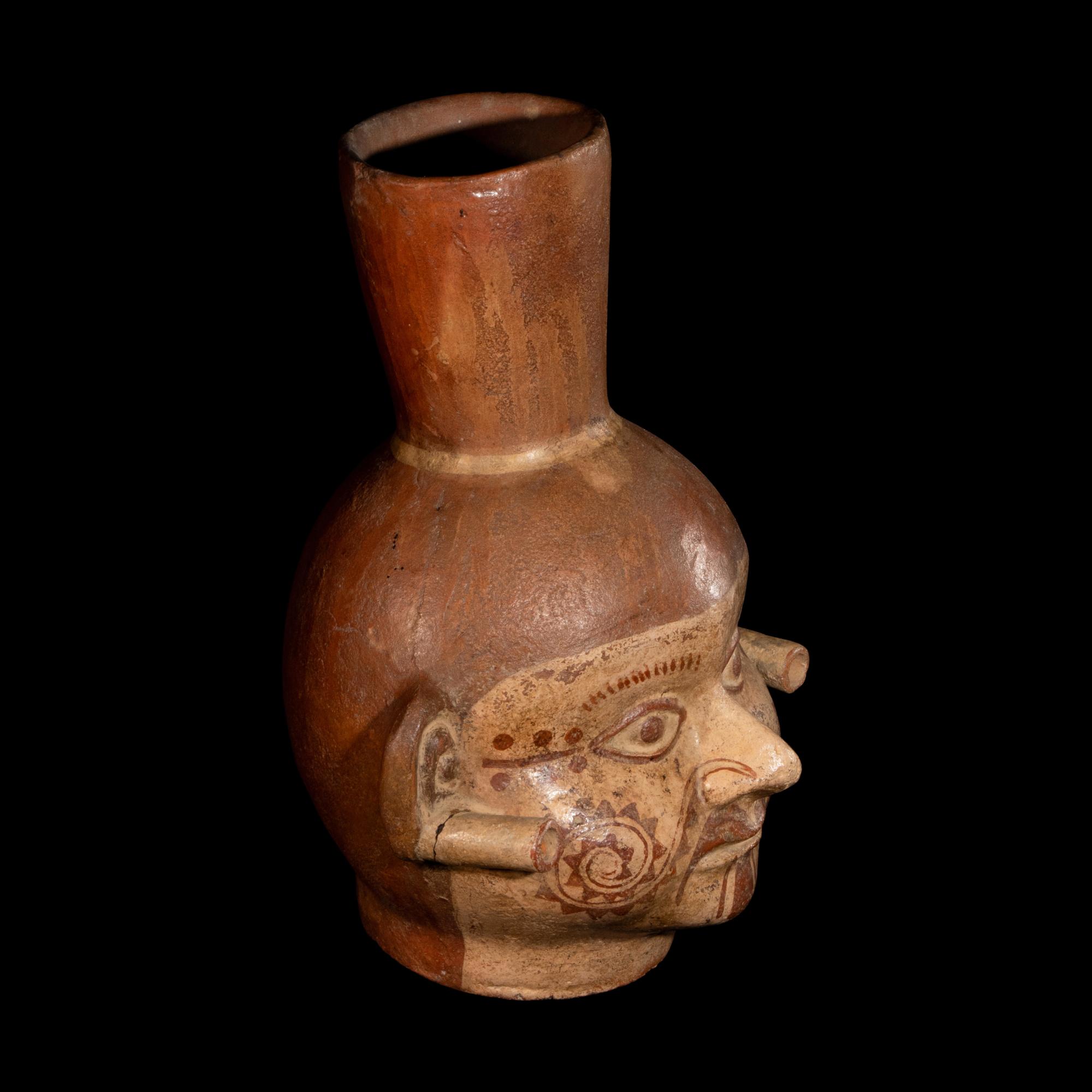 A Moche Portrait Head Vessel