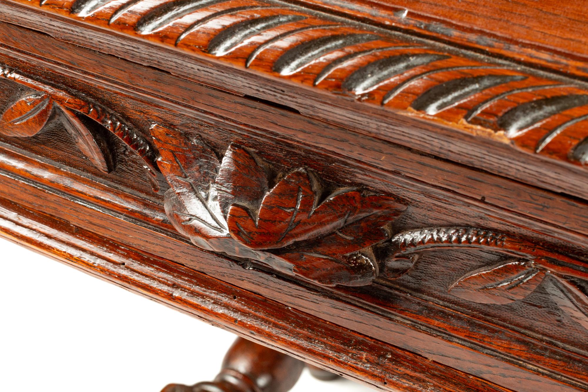 A French Renaissance Revival Walnut Library Table